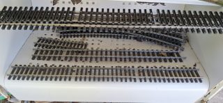 Track In Need Of Repair Above And Repaired Below