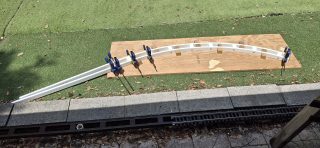 Gluing The 10' Diameter PVC Stringer Half At A Time
