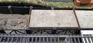 Close Up Detail Of Platform Frame Surrounding Half Block Installed